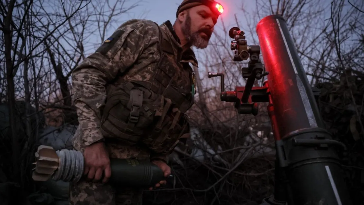  File Photo: This handout photograph taken on November 19, 2024 and released by the Press Service of the 24 Separate Mechanized Brigade, shows a Ukrainian serviceman of the 24 Separate Mechanized Brigade prepares to fire mortar towards Russian positions near the town of Chasiv Yar, in the Donetsk region. Photograph:(AFP) 