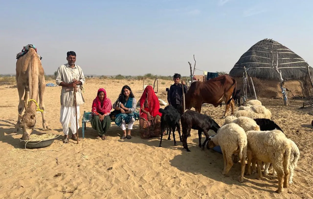 Aakriti Srivastava with a pastoral family and its herd. Pic: Bahula Naturals