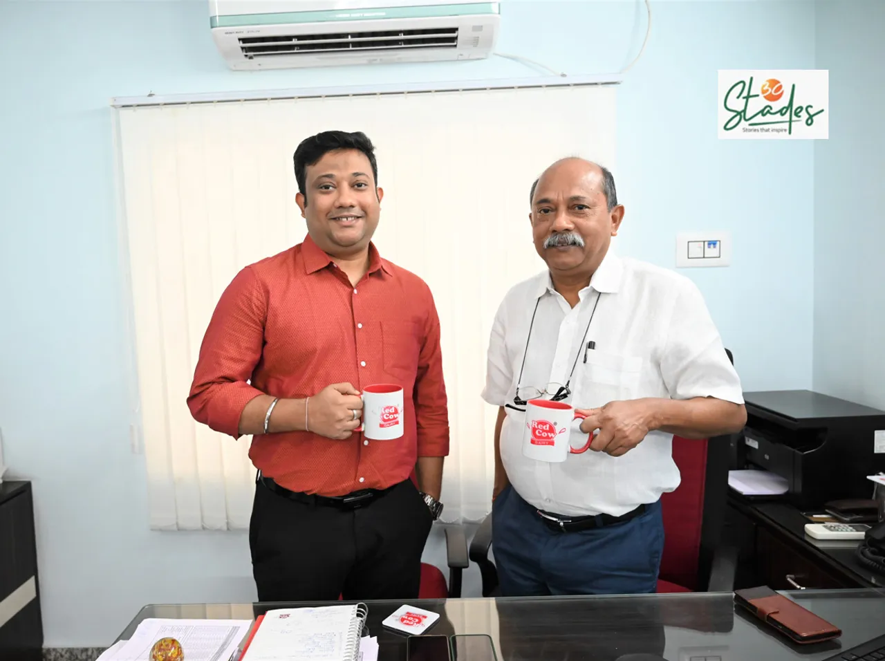 Narayan Majumdar, Founder of Red Cow Dairy, (right) with his son Nandan (left)