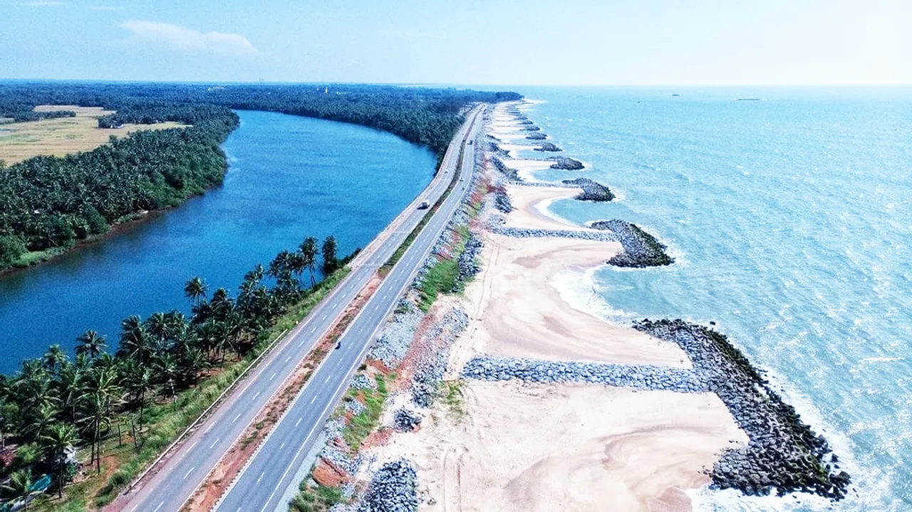 National Highway 66 (earlier NH-17) runs parallel to the sea on one side and the river on the other side of Maravanthe Beach. Pic: Karnataka Tourism