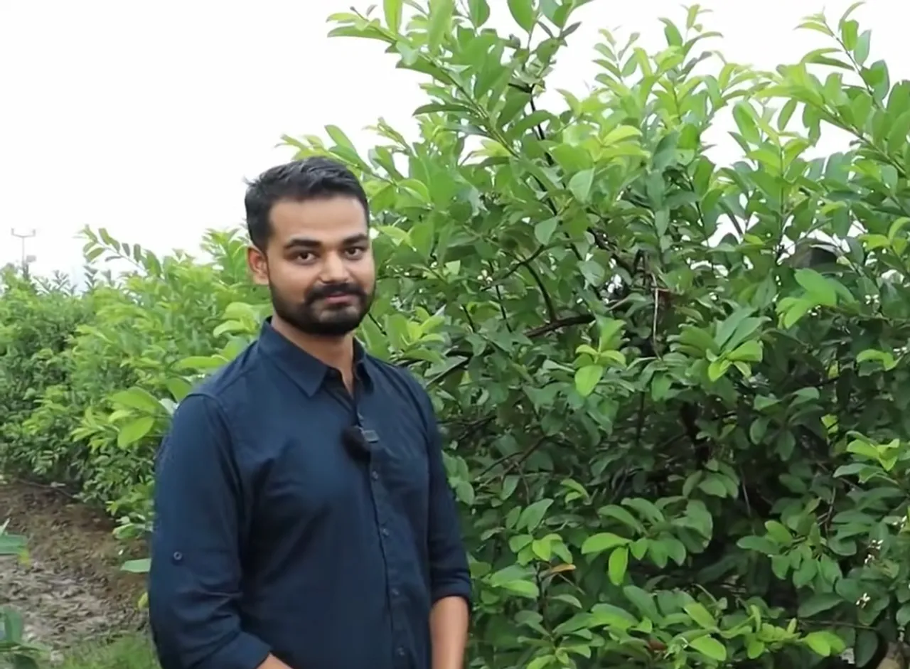 Kabir Chandrakar at his farm in Mujgahan Village in the Raipur district of Chhattisgarh