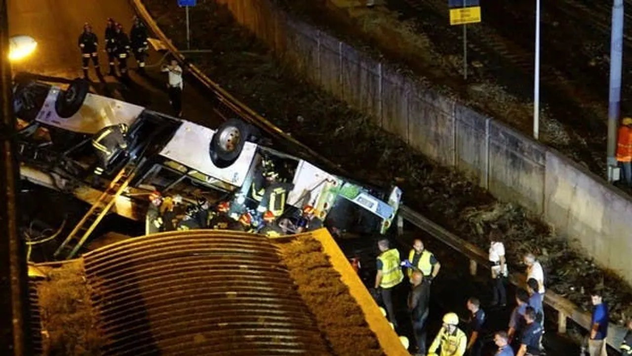 bus plunges off bridge 