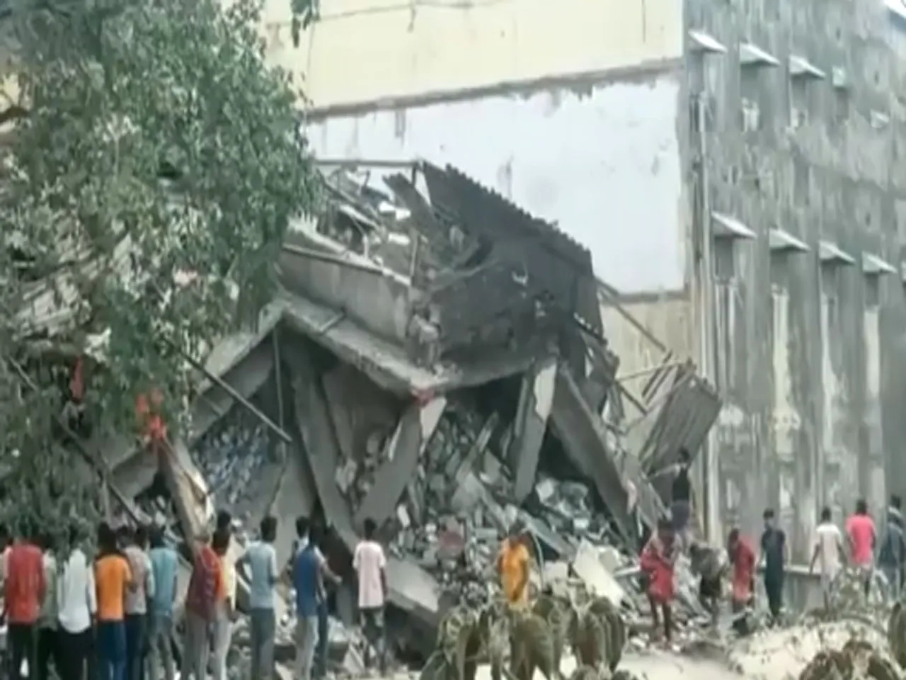 A multi storied building collapsed, Many people feared trapped