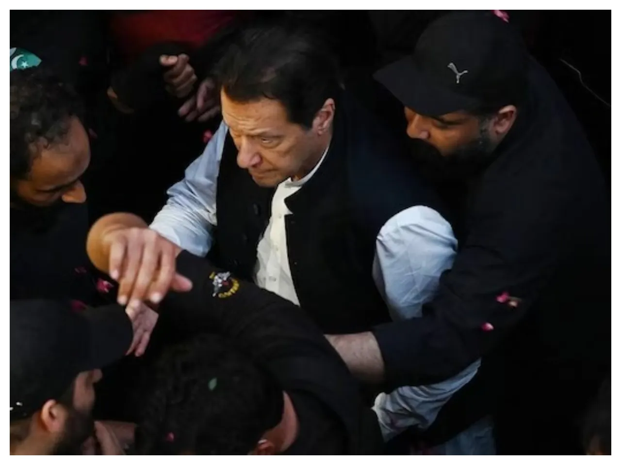 Imran's police drugs and drags him like a condemned prisoner