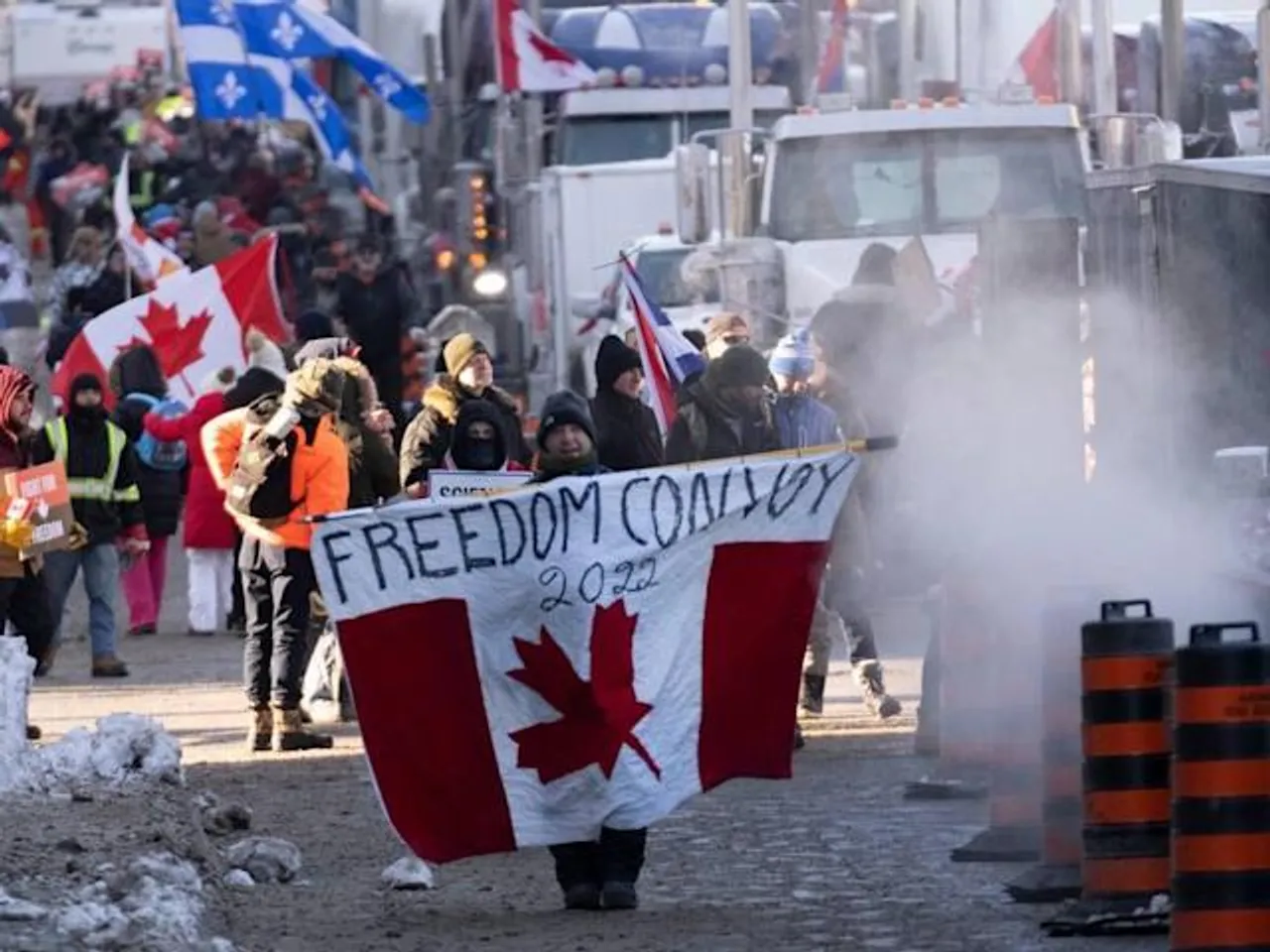 THOUSANDS OF VEHICLES, PEDESTRIANS ARIVE WITH TRUCK CONVOY IN OTTAWA.