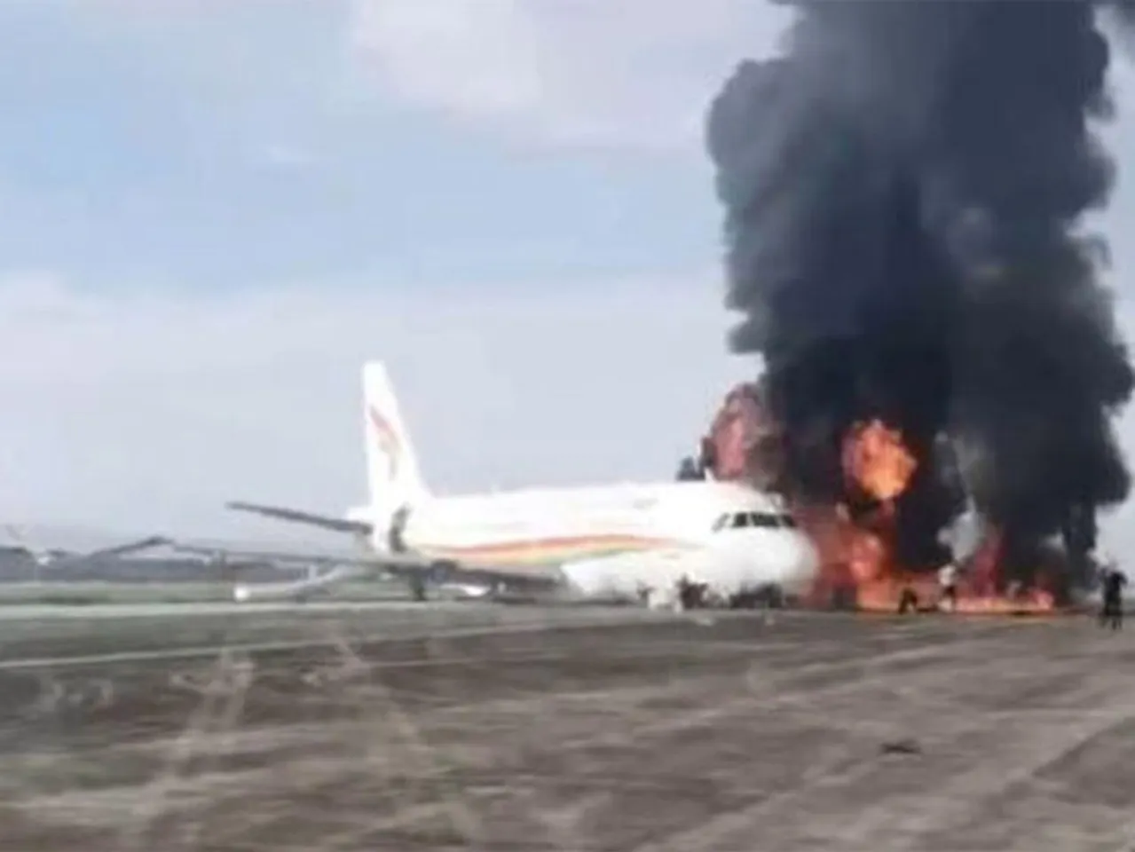 Tibet Airlines plane catches fire after falling off runway