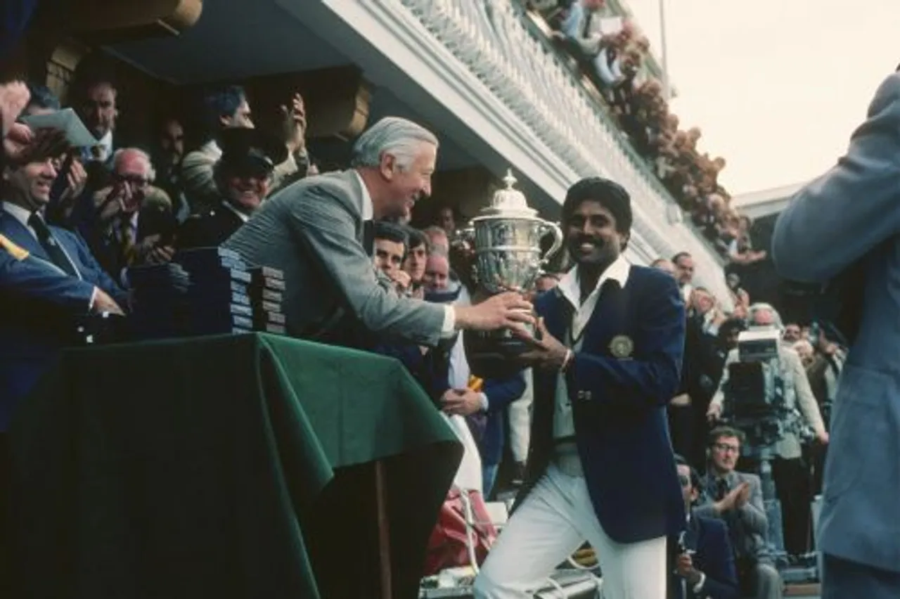 Kapil Dev lifting World Cup 1983