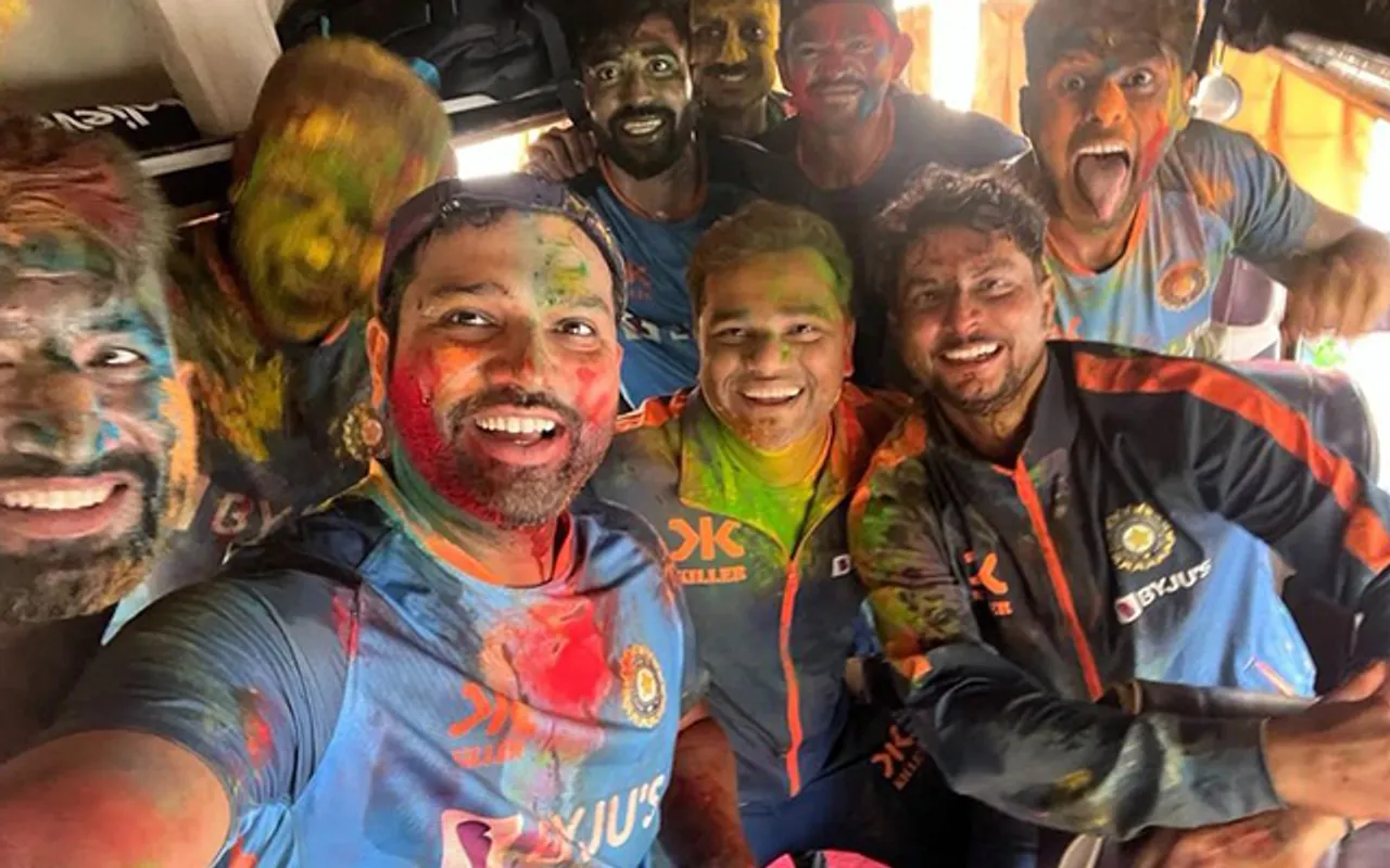 Team India playing Holi