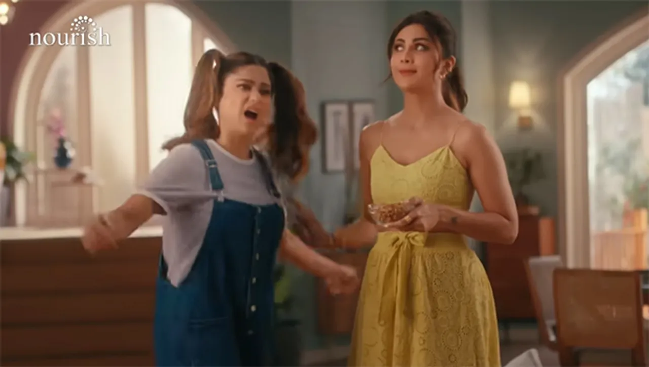 Nourish's new TVC shows Shilpa Shetty listing the benefits of quality dry fruits consumption to sister Shamita