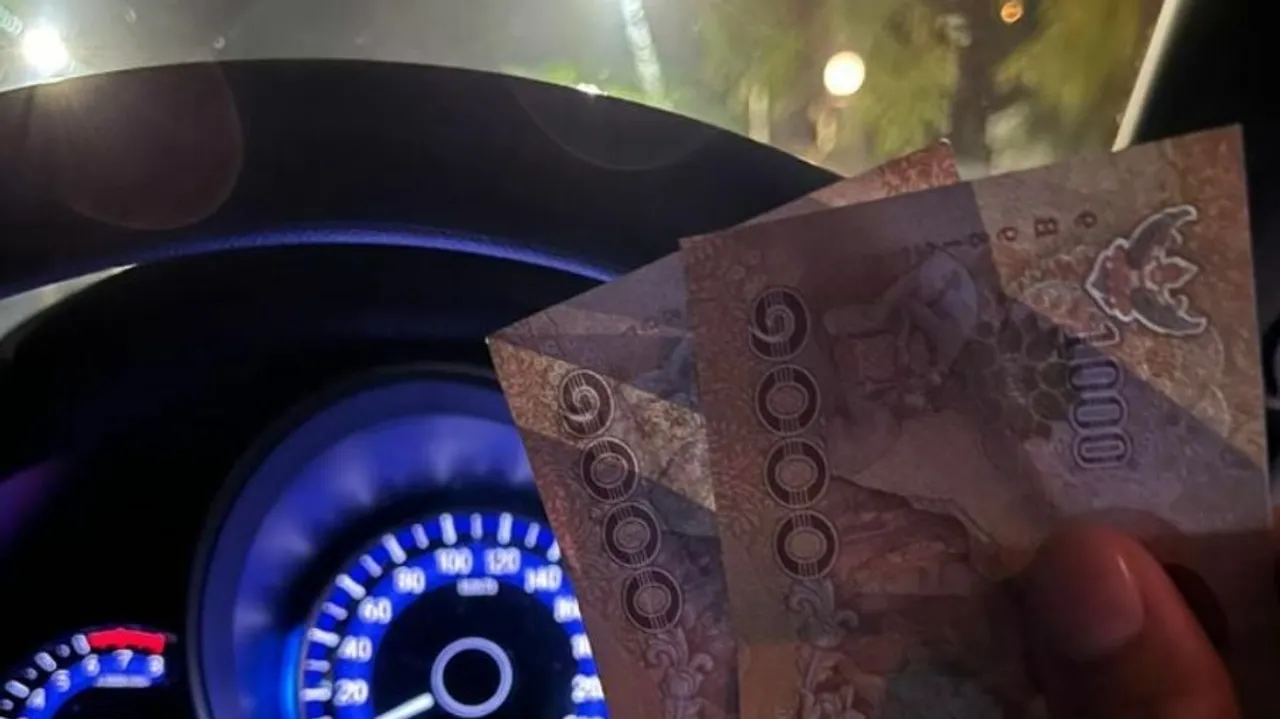 Chinese Woman Receives Bogus Banknotes as Reward for Returning Lost iPhone, Sparks Legal Debate