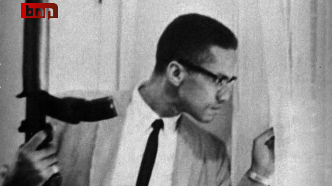 Rare Photograph of Malcolm X Carrying a Rifle Uncovered