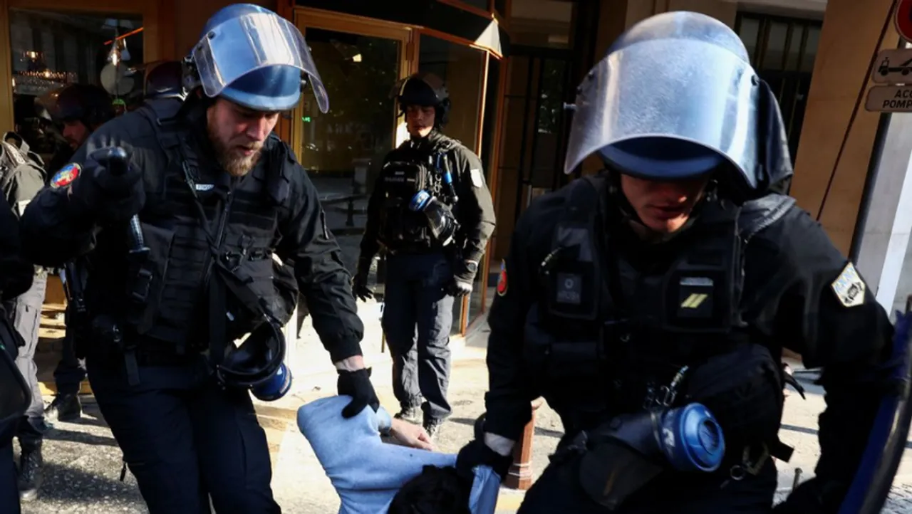 Chaotic Clash as Riot Police Use Pepper Spray on Climate Activists at TotalEnergies' Shareholder Meeting