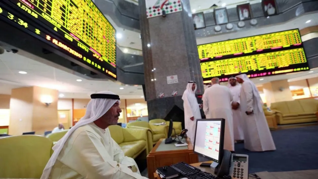 An investor monitors a screen displaying stock information at the Abu Dhabi Securities Exchange June 25, 2014
<br>
Image Credit: Reuters/File Photo