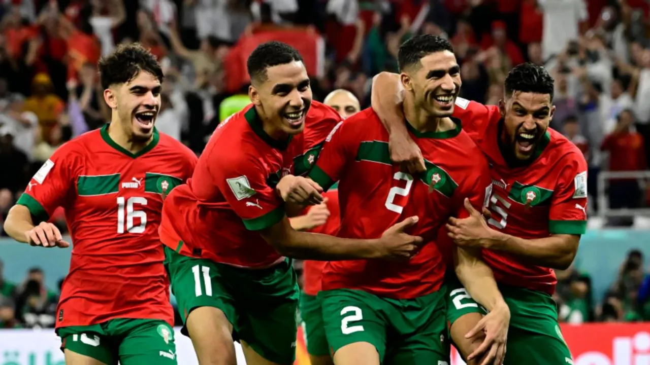 Moroccan players celebrating a goal
<br>
Image Credit: SportingNews