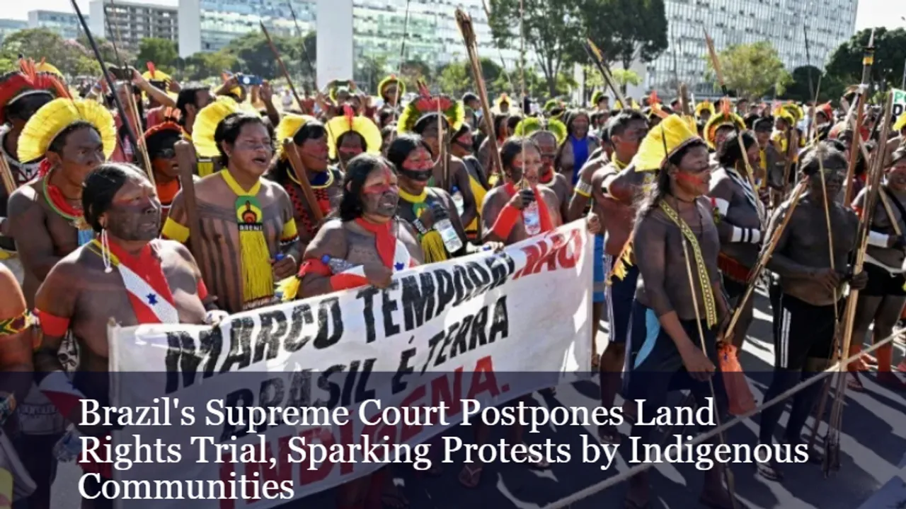 Indigenous Brazilians demonstrate in Brasilia June 7, 2023 against the 1988 time limit for recognizing certain Indigenous lands <br> Image Credit: Yahoo.com/Evaristo SA