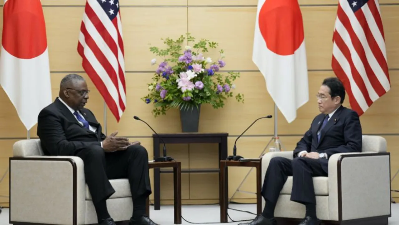 U.S. Defense Secretary Lloyd Austin, left, and Japanese Prime Minister Fumio Kishida speak during their meeting at the prime minister's office in Tokyo on Thursday
<br>Image Credit: AP