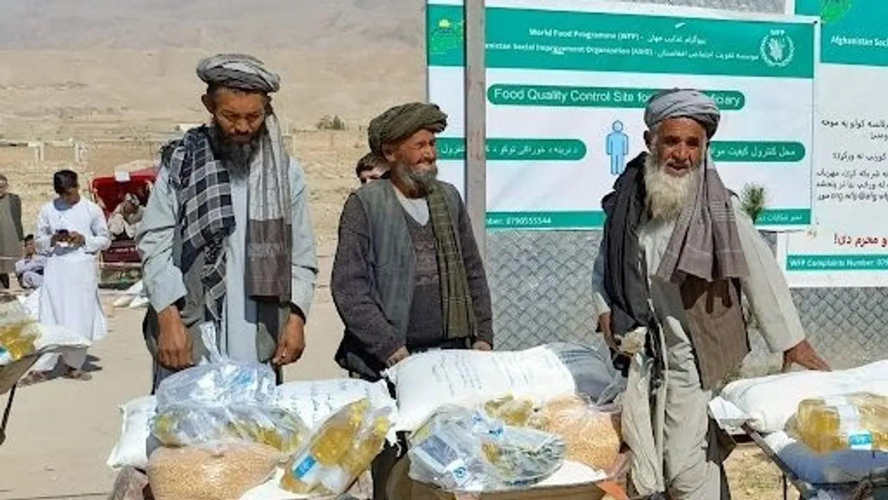 Aid Organizations Distribute Food and Cash to Needy Families