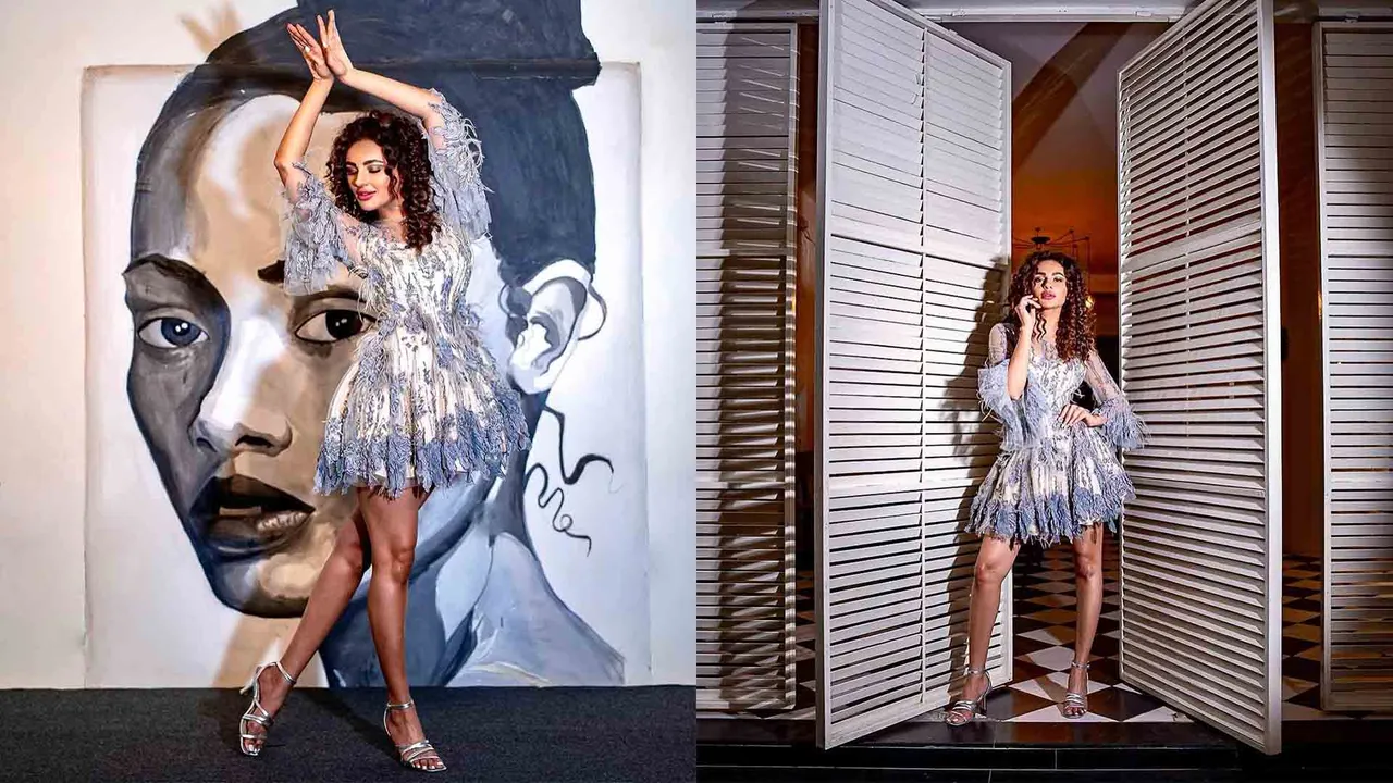 Seerat Kapoor's Creative Photoshoot in Stylish White Dress