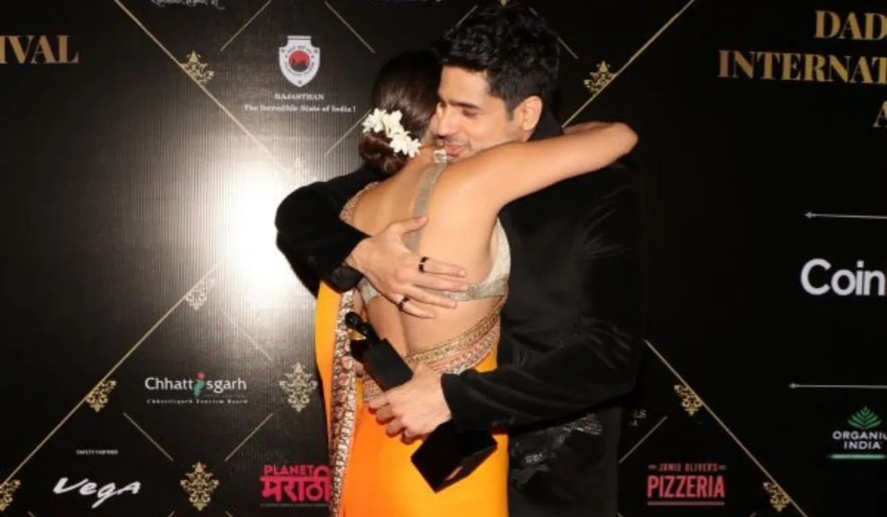 Actress Kiara Advani and Siddharth Malhotra hugs Eachother at Dada Saheb Phalke Awards