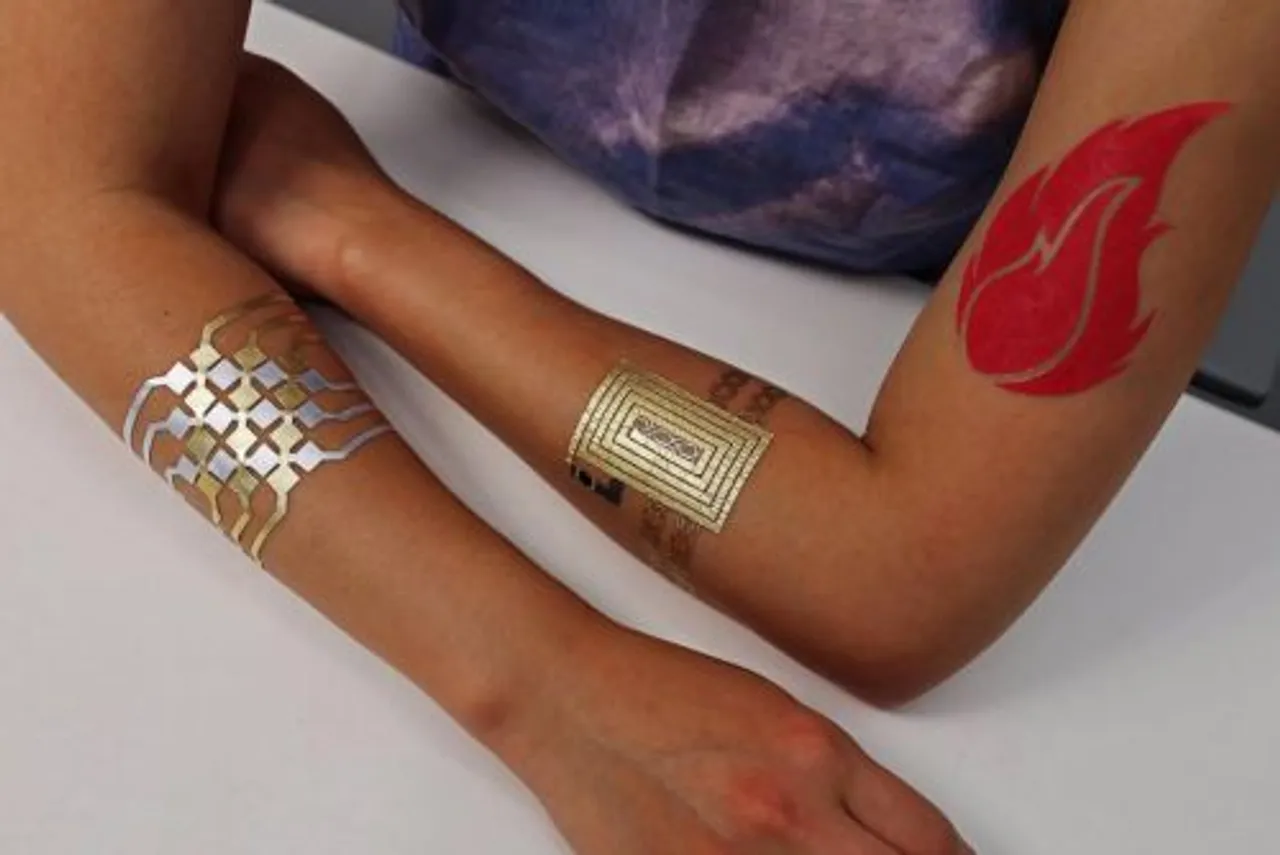 CIOL Check out this gold and silver tattoo that can control your smart phone
