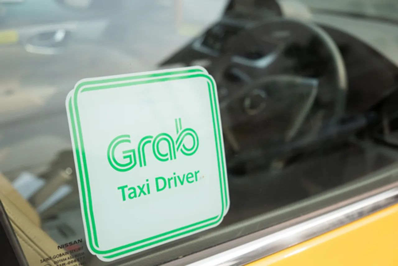 CIOL Uber rival Grab to acquire Indonesian payment startup Kudo