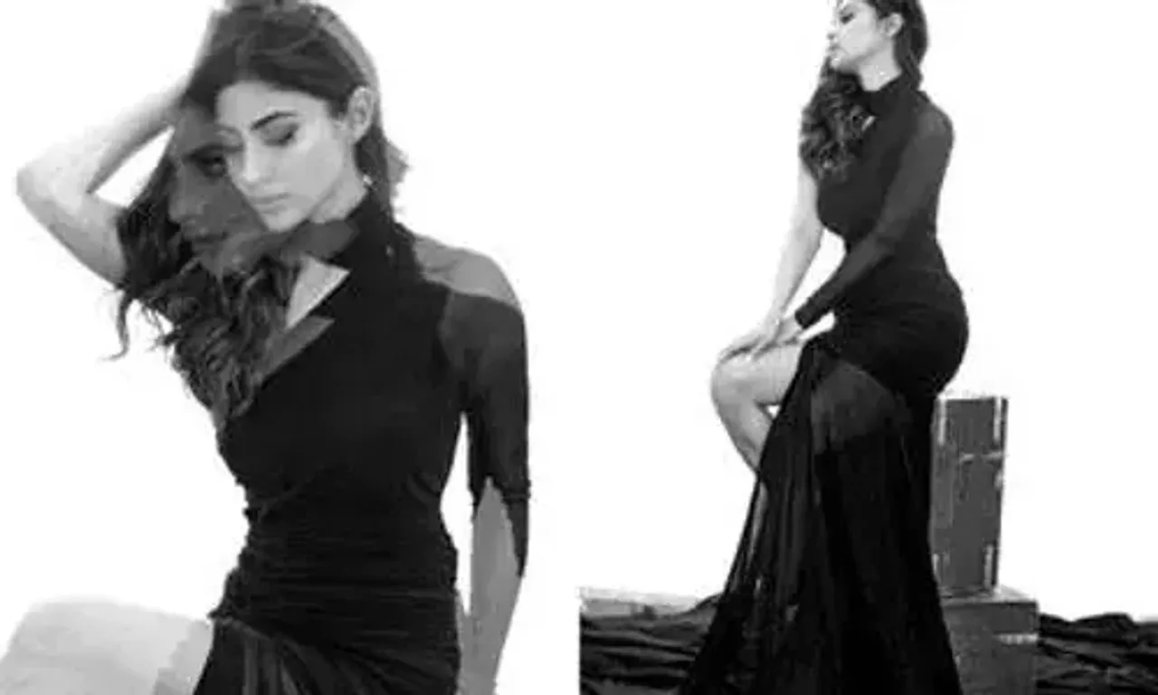 Mouni Roy mesmerises fans with her glamours look in a black off-shoulder gown