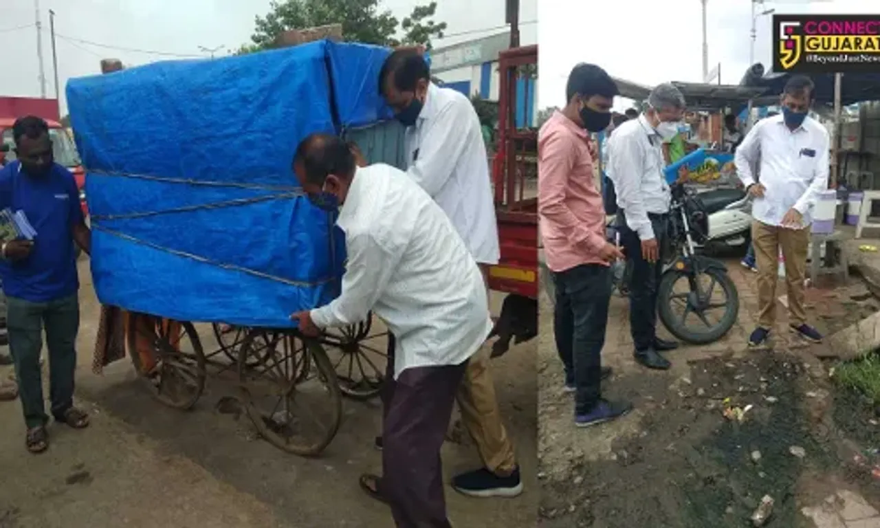 Innovative approach by Vadodara Municipal Corporation as officers on foot remove haphazardly parked vehicles and larries in Vadodara