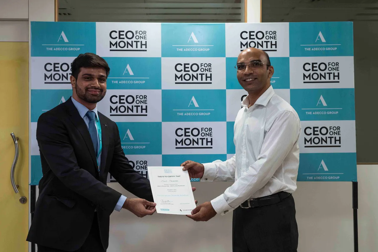 From left Mohit Mahajan receiving certificate from Priyanshu Singh Country Manager MD Adecco Group India
