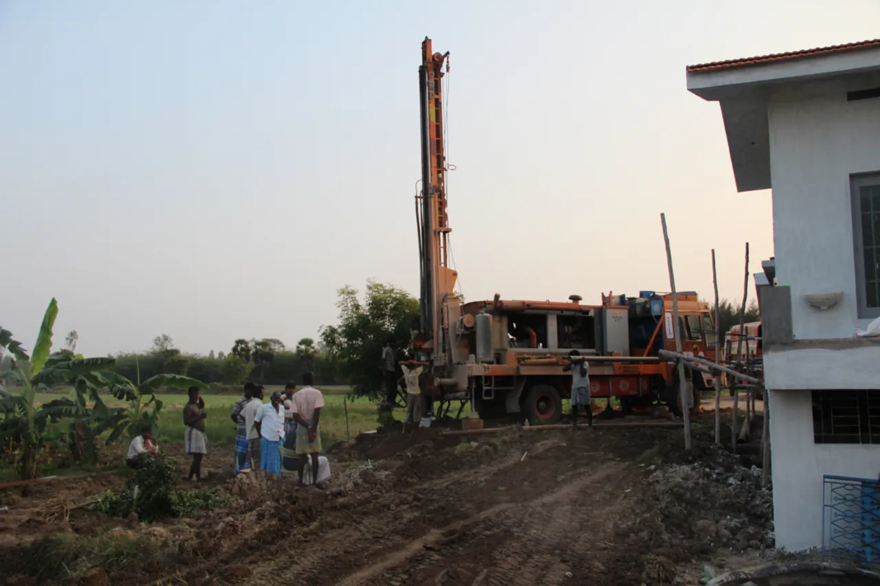 Drilling the borewell.