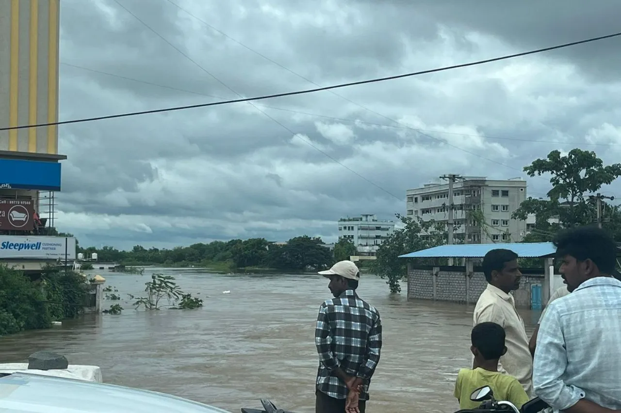 What caused devastating floods in Khammam?