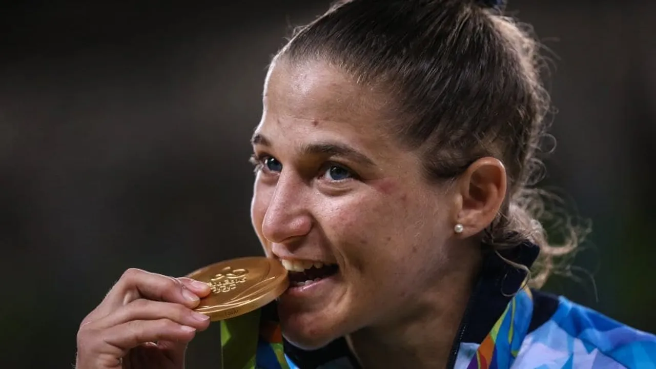 Why athletes bite their medals