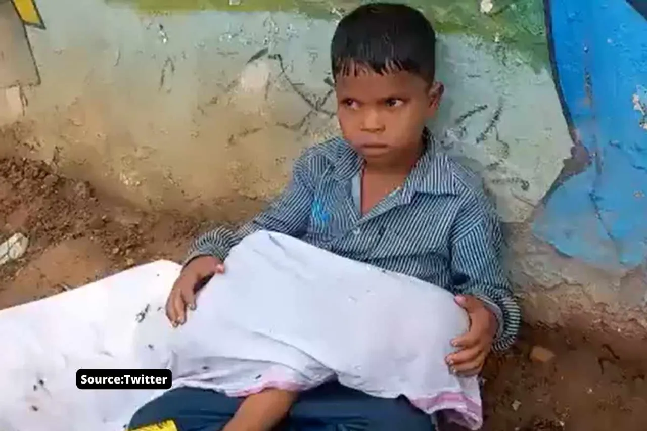 morena 8 year old boy with brothers body in lap