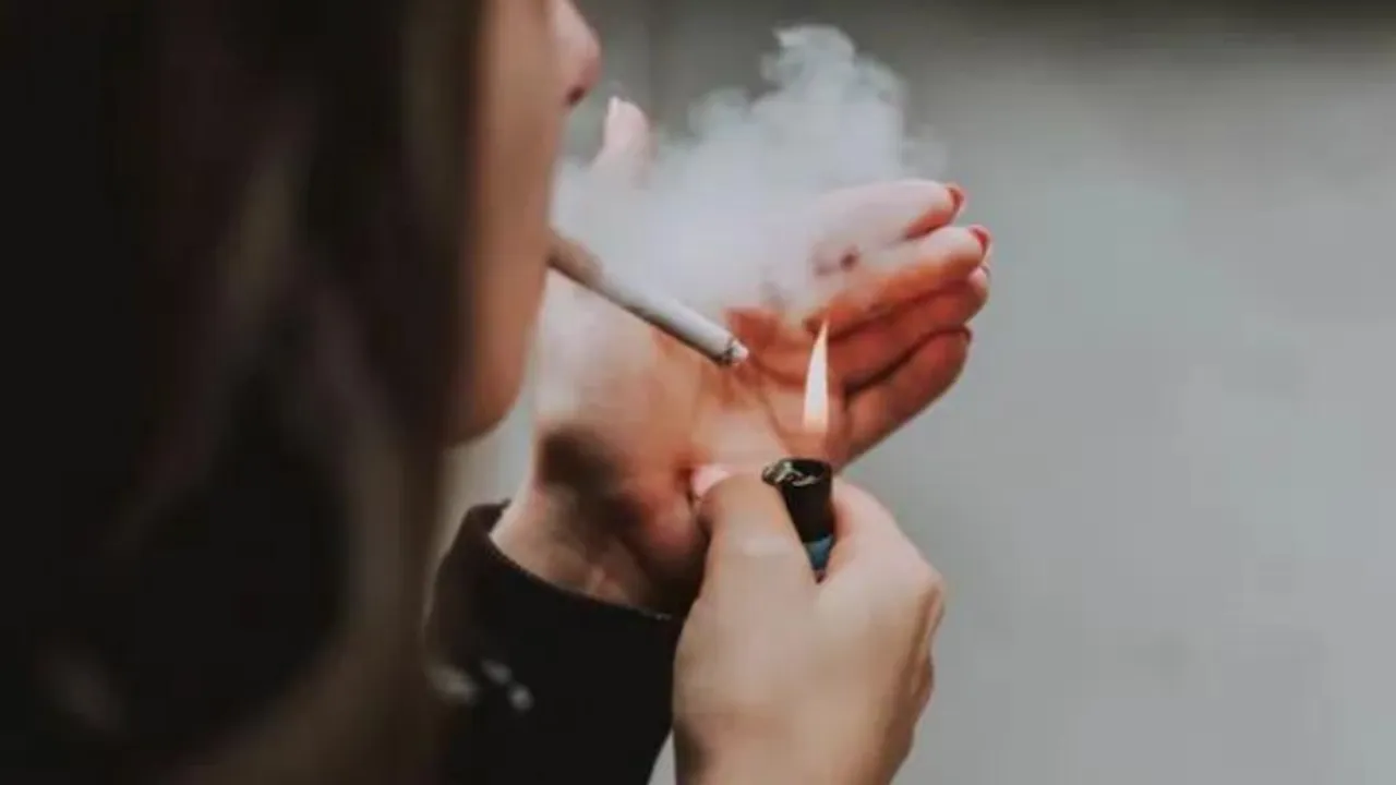 Smoking Woman Holding Toddler Sparks Social Media Outrage