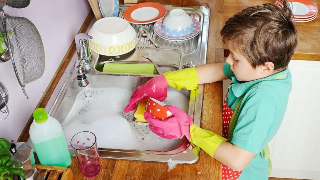 boy doing household chores