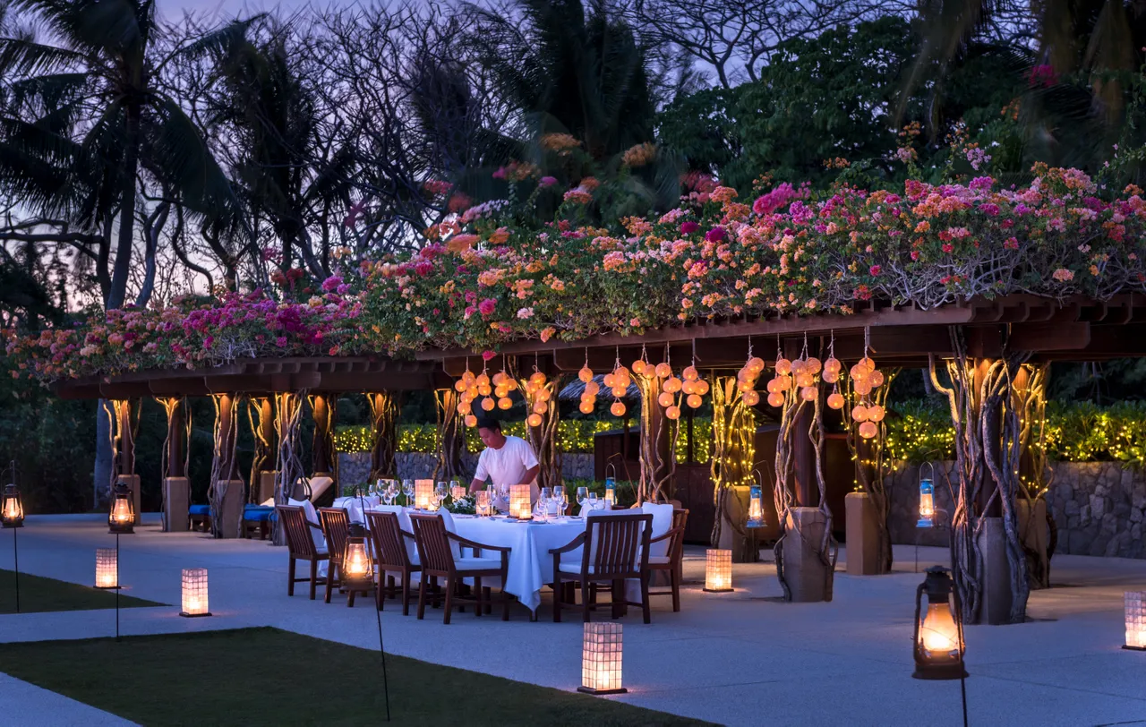 Amanpulo Philippines  Dining Clubhouse Restauran Poolside Trellis Dinner with Team Member 14193