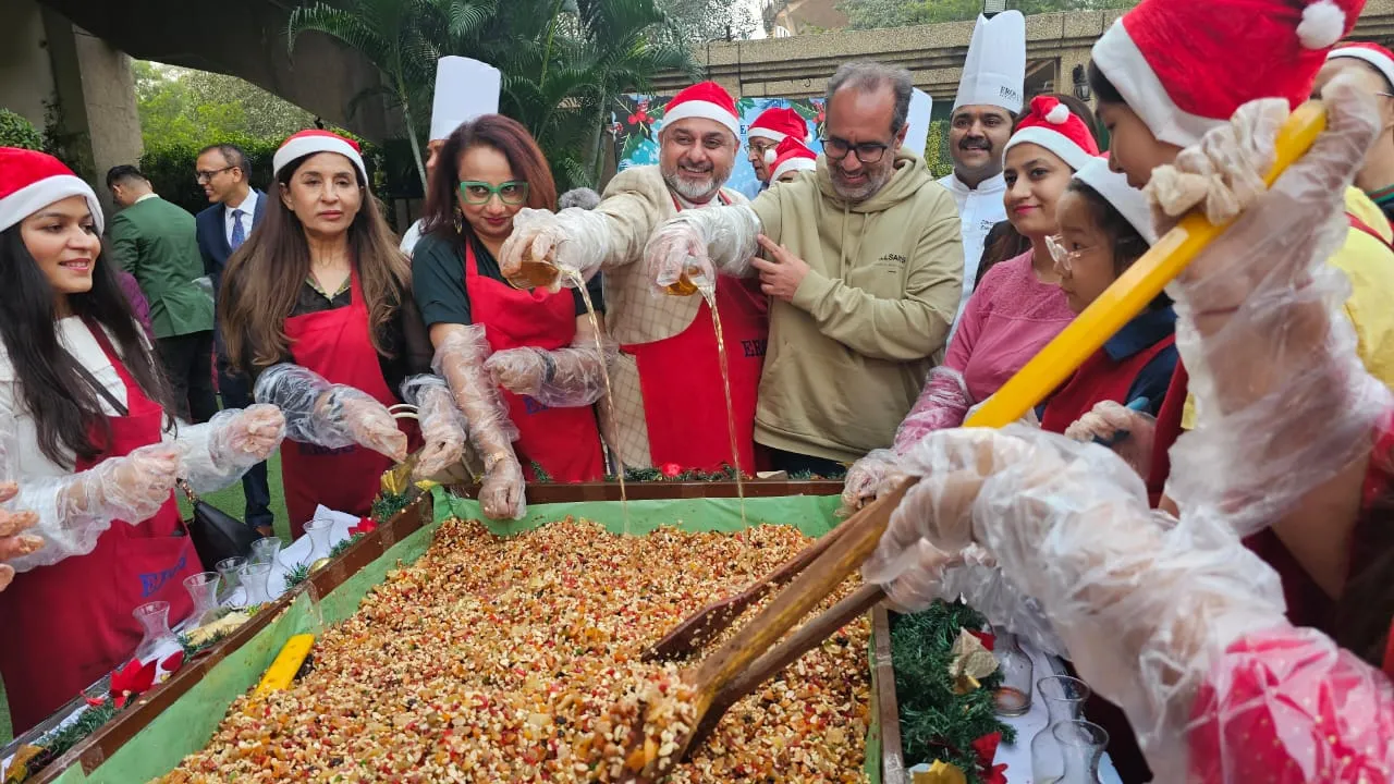 Cake Mixing Ceremony at Eros Hotel _ Mr Davinder Juj, General Manager, Eros Hotel, New Delhi at centre