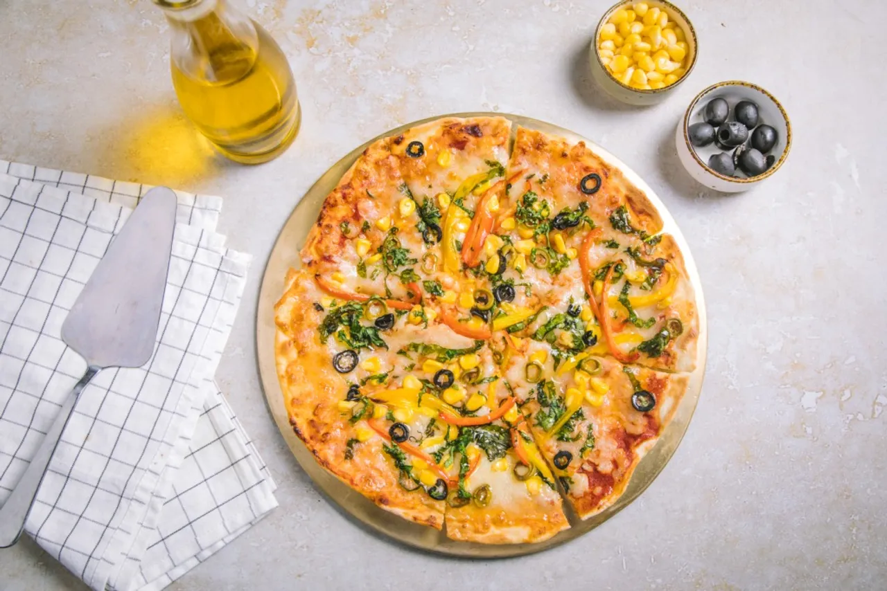 Grab a Slice of your Favourite Pizza at Taj Club House!