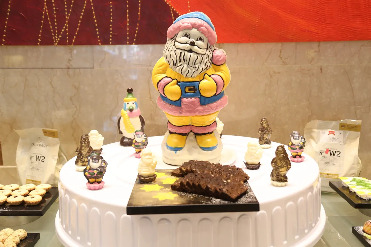 Unwrap the magic of the holidays with Christmas gift hampers at Truffles, Feathers, A Radha Hotel