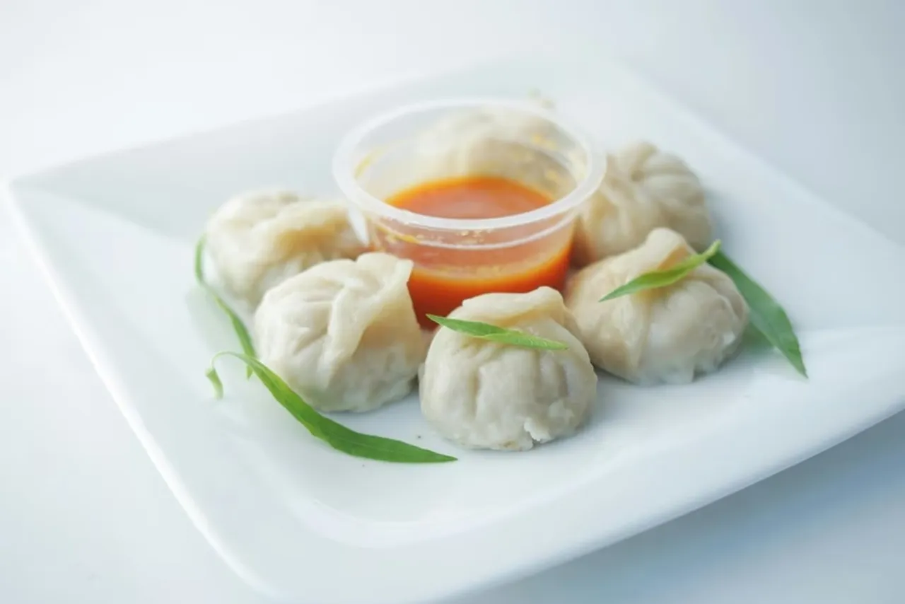 Famous momo places: ভারতে এমন অনেক জায়গা রয়েছে যেখানে আপনি সবচেয়ে সুস্বাদু মোমো পেতে পারেন