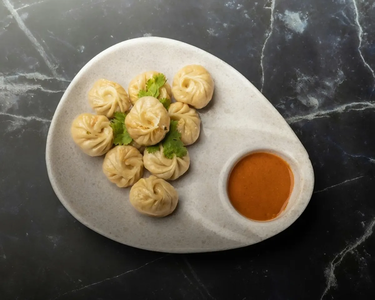 Famous momo places: ভারতে এমন অনেক জায়গা রয়েছে যেখানে আপনি সবচেয়ে সুস্বাদু মোমো পেতে পারেন