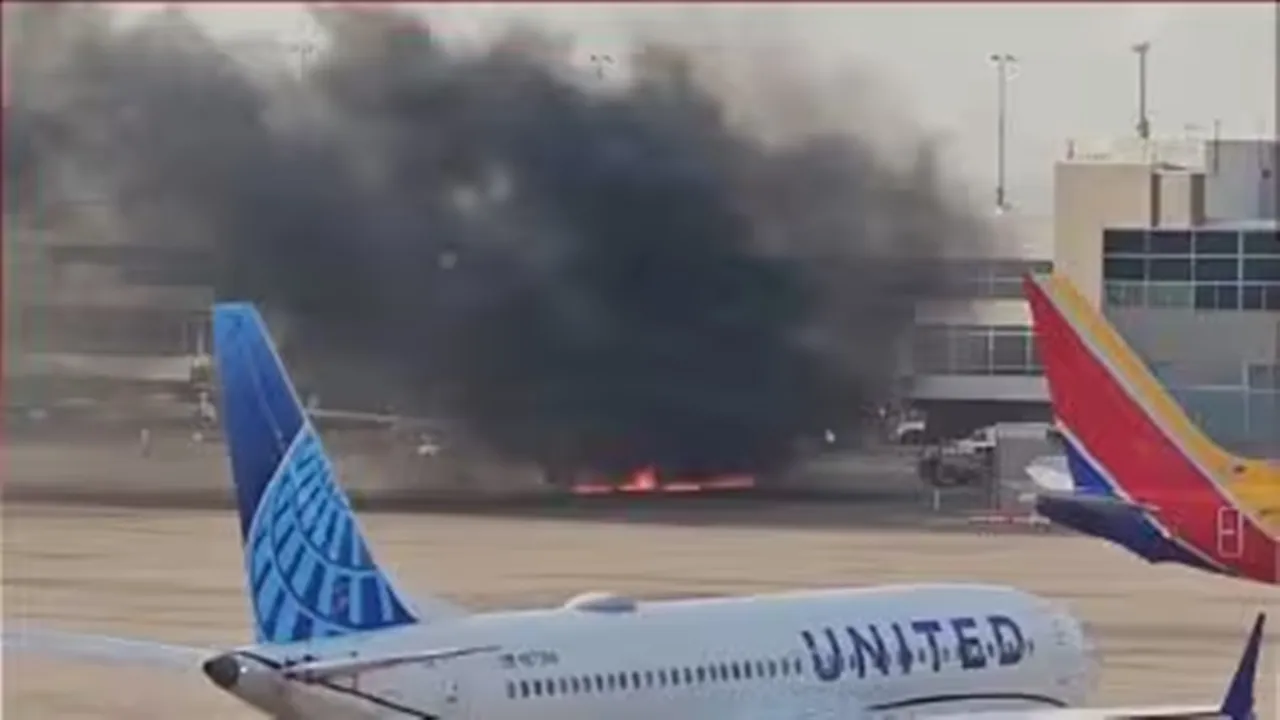 American Airlines Plane Catches Fire at denver airport passengers evacuate via wing