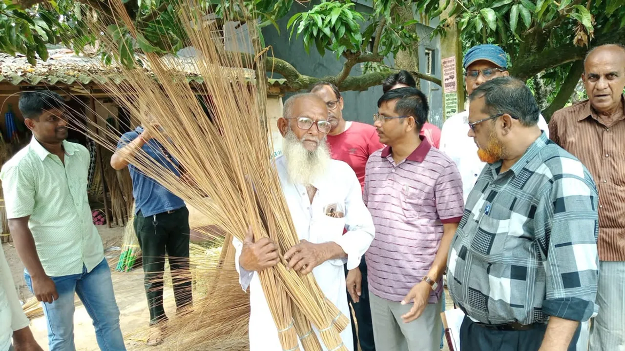 Abdus Samad of Mangalkot is showing direction of income by making broom