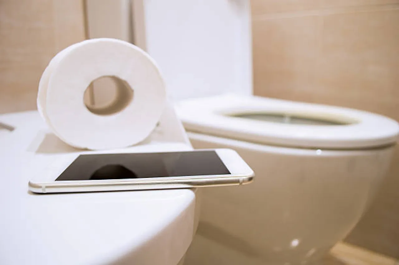 mobile in restroom