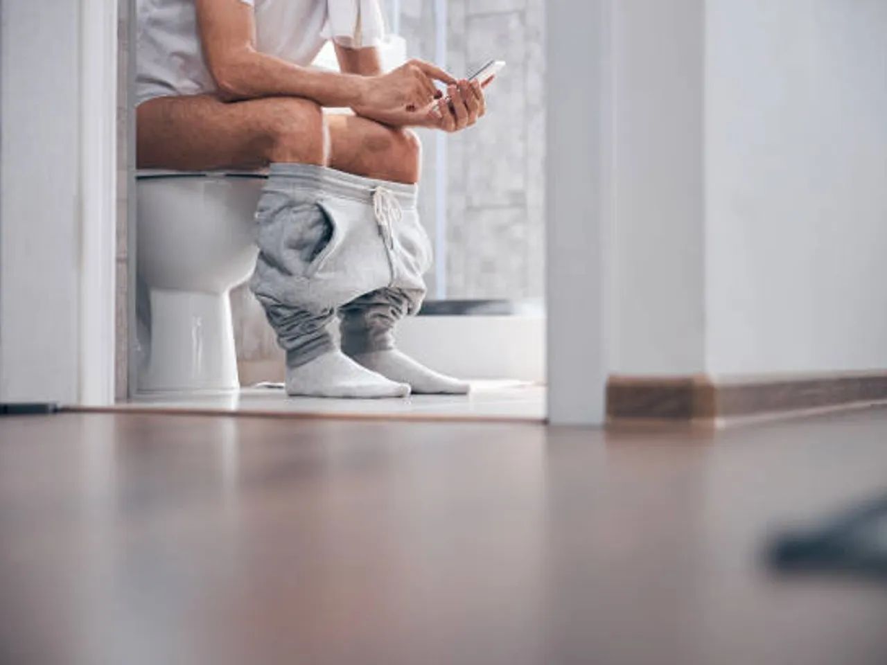 mobile in restroom