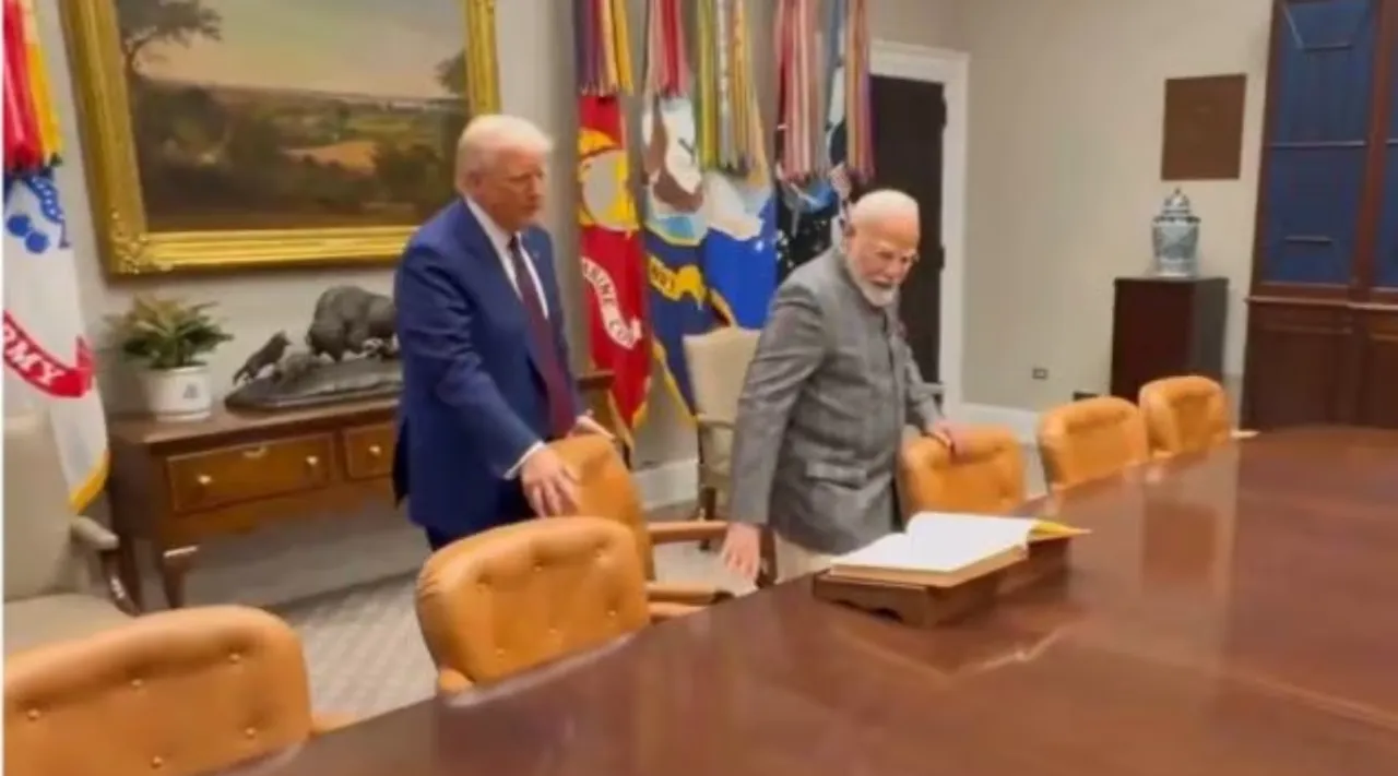 video President Trump pulls chair for PM Modi during meeting at White House Tamil News