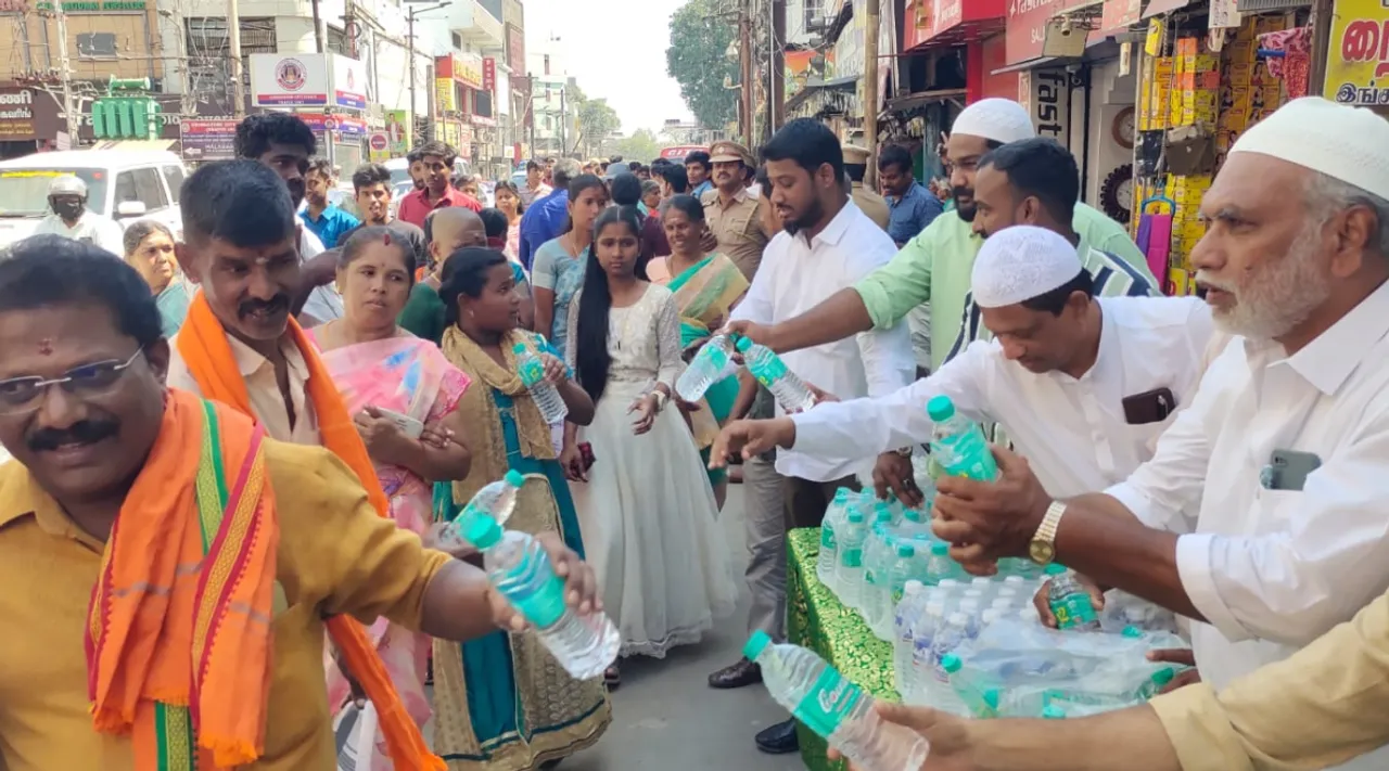  Video Muslims provide water bottle to devotees of Coimbatore Koniamman Temple festival Tamil News 