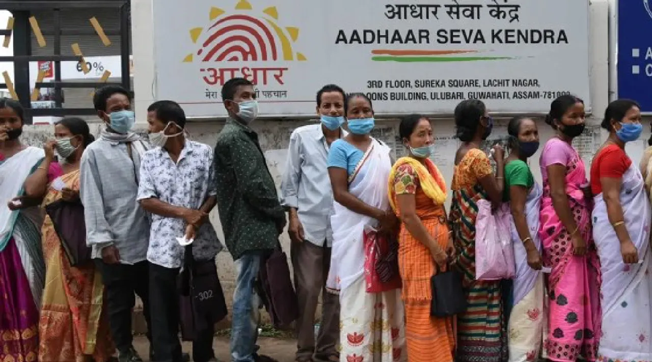 Aadhaar seeding with voter ID and EC wants law amended to clarify its voluntary Tamil News 