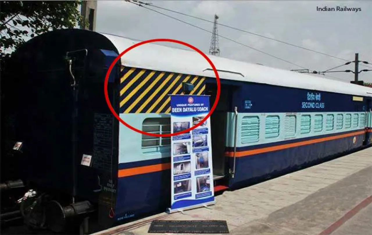 Why do railway coaches have these different stripes
