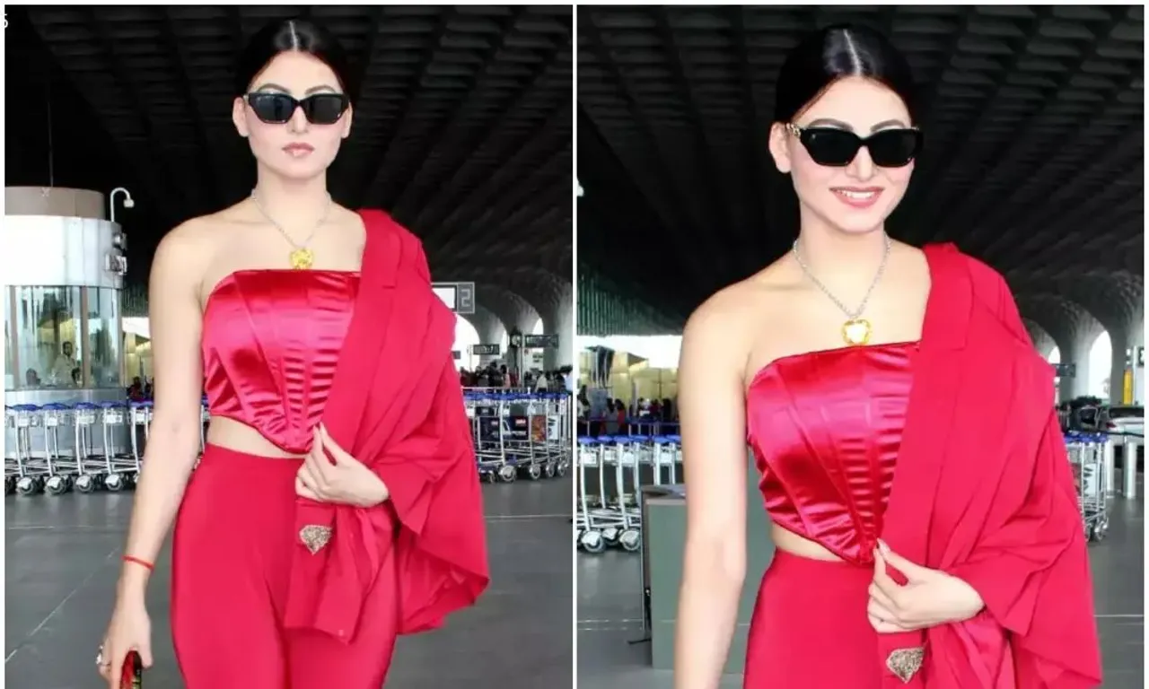 लाल मिर्च से काम नहीं लग रही अभिनेत्री उर्वशी रौतेला, हुए एयरपोर्ट पे लाल रंग के कोर्सेट ड्रेस में स्पोट