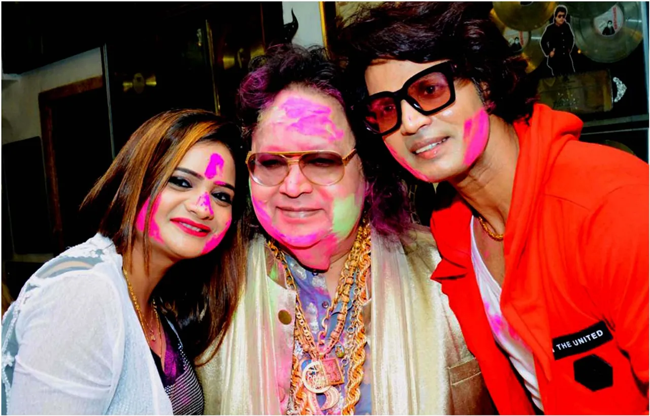 Singer Bappi Lahiri And People Celebrate Holi Festival In Mumbai On Tuesday
